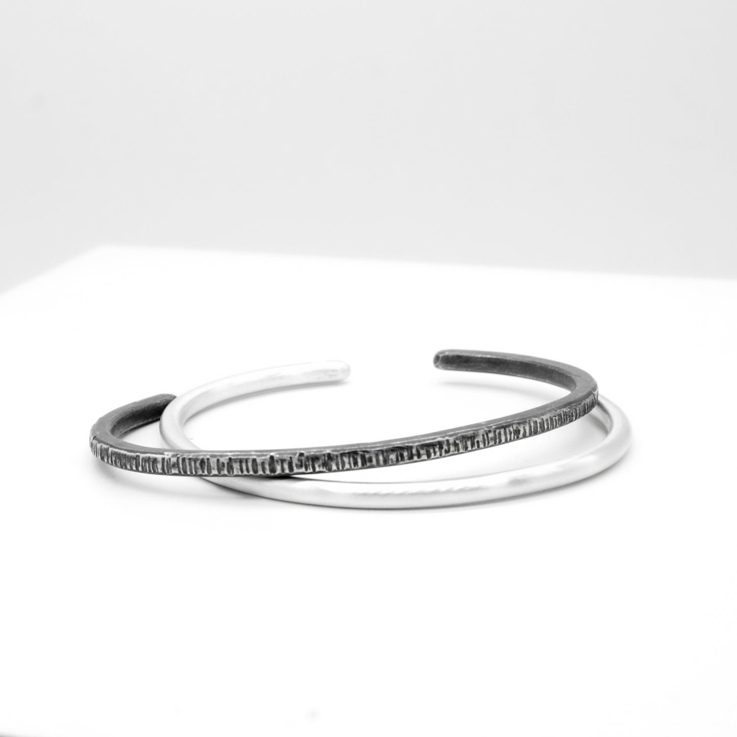 PULSERA DE PLATA NEGRA A RAYAS - N.AG/192