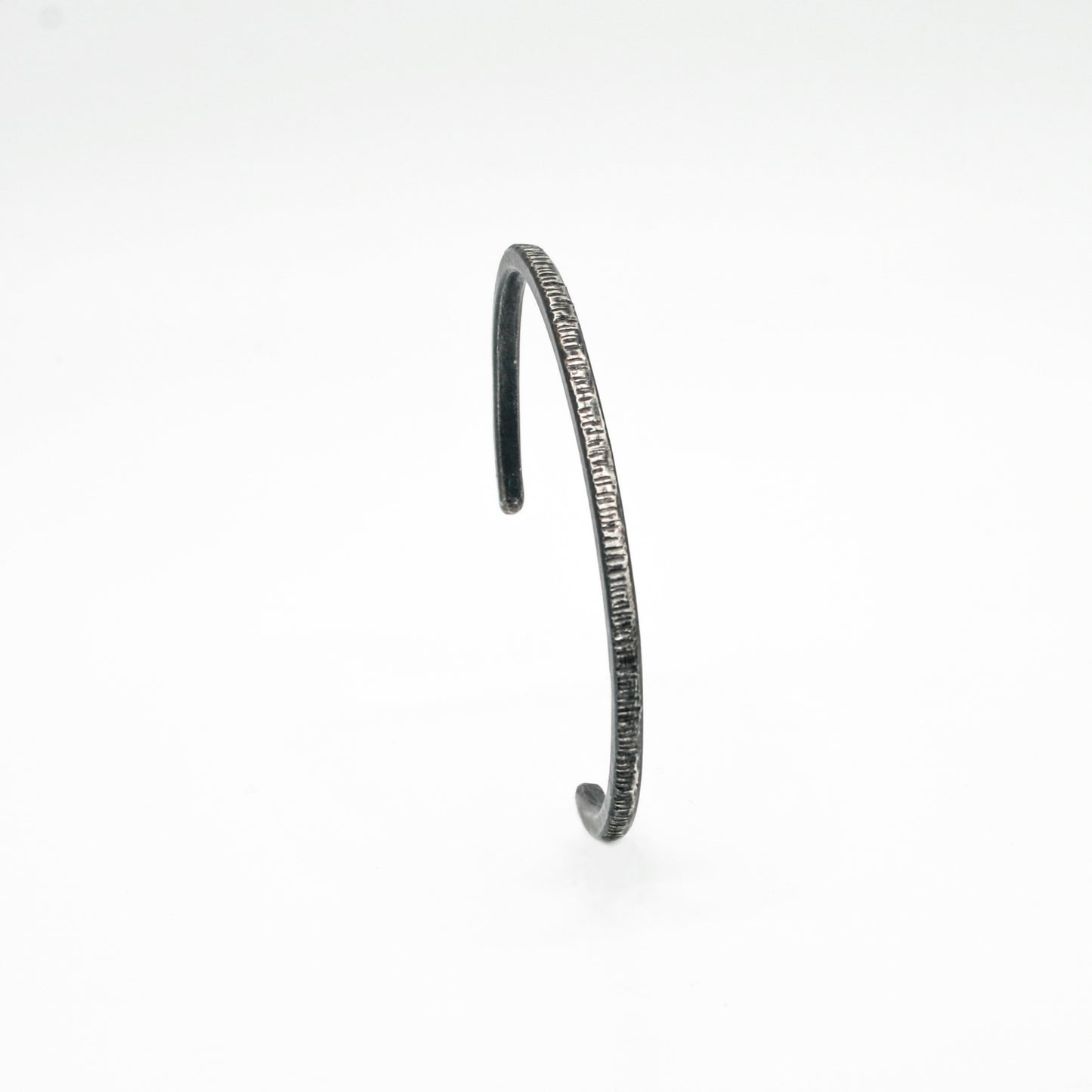 PULSERA DE PLATA NEGRA A RAYAS - N.AG/192